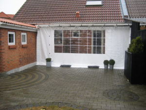 Afdækket terrasse skrå fra