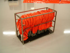 Nedpakket flydespærring